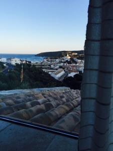 a view of a city from the roof of a building at Es volca in Cadaqués