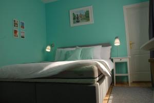 Posteľ alebo postele v izbe v ubytovaní Joy Guesthouse