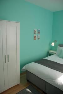 Posteľ alebo postele v izbe v ubytovaní Joy Guesthouse