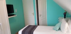 Posteľ alebo postele v izbe v ubytovaní Joy Guesthouse