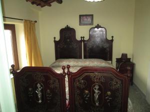 Posteľ alebo postele v izbe v ubytovaní Casa e Putia
