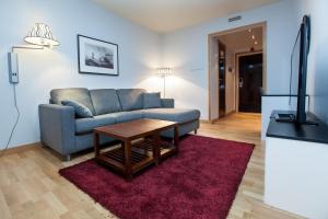 TV a/nebo společenská místnost v ubytování F2 Hotel