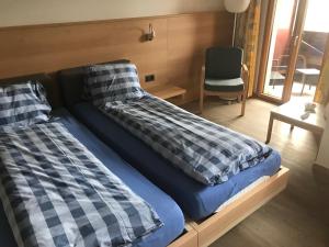 Postelja oz. postelje v sobi nastanitve Hotel Restaurant Kulm