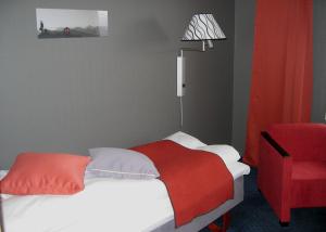 Postel nebo postele na pokoji v ubytování F2 Hotel