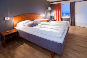 Postel nebo postele na pokoji v ubytování F2 Hotel