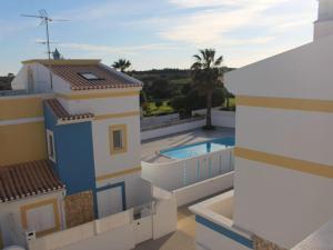 a view of a house with a swimming pool at Europa Beach House in Manta Rota