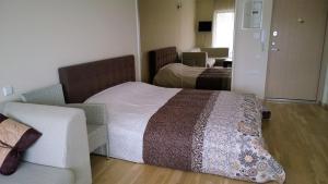 Ένα ή περισσότερα κρεβάτια σε δωμάτιο στο Perlo apartamentai +28 φωτογραφίες