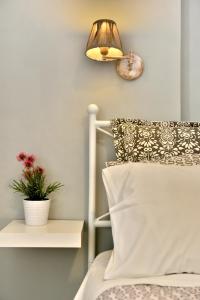 Postel nebo postele na pokoji v ubytování Guesthouse Corali