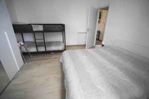 A bed or beds in a room at Moralma