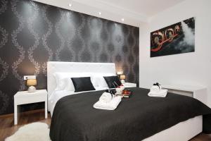 Postel nebo postele na pokoji v ubytování Zadar Luxury Rooms