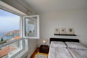 En eller flere senge i et værelse på Apartment 330