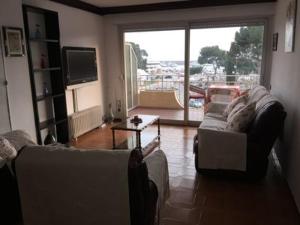 Posezení v ubytování 1ra Linea Platja de Sant Feliu