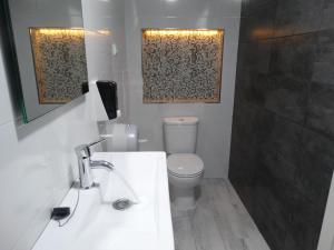 Koupelna v ubytování Albergue da Costa