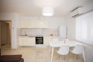 Η κουζίνα ή μικρή κουζίνα στο Apartment Bilo