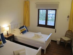 Llit o llits en una habitació de At a sea view top-floor apt, 500 m from the beach!
