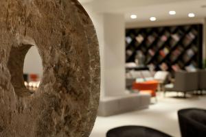 a close up of a stone sculpture in a lobby at Wyndham Stuttgart Airport Messe in Stuttgart
