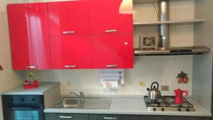 Virtuvė arba virtuvėlė apgyvendinimo įstaigoje Corso Sempione Apartment