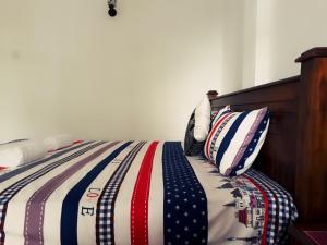 Postel nebo postele na pokoji v ubytování Himawari Beach Villa