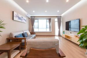 Televisyen dan/atau pusat hiburan di Shenzhen New Swan Castle Apartment