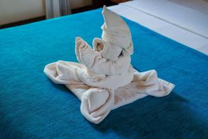 Ein Bett oder Betten in einem Zimmer der Unterkunft Puri Bagus Candidasa