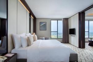 TV a/nebo společenská místnost v ubytování Wyndham Opi Hotel Palembang