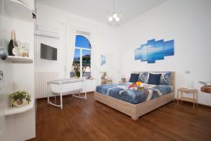 A bed or beds in a room at La Terrazza 38