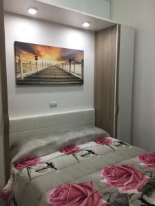 Ένα ή περισσότερα κρεβάτια σε δωμάτιο στο Alloggio Tulipano
