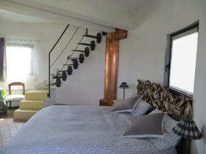 Postel nebo postele na pokoji v ubytování I Silos Guest house