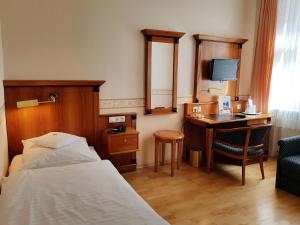 Postel nebo postele na pokoji v ubytování Hotel Krupp + 37 fotografií