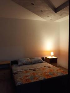 Postel nebo postele na pokoji v ubytování Hostel Yugoslavija 1