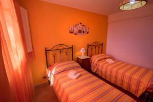 A bed or beds in a room at Villa Laura Salento