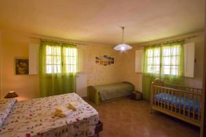 A bed or beds in a room at Villa Laura Salento