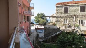 a view of a street from a window of a building at Beachfront Apartments Oaza in Petrovac na Moru