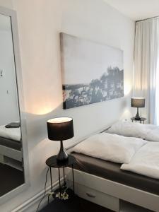 Postel nebo postele na pokoji v ubytování Nice n' Nordic 4