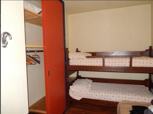 Postel nebo postele na pokoji v ubytování Centrale vicino cabinovia Magnolta e piscina