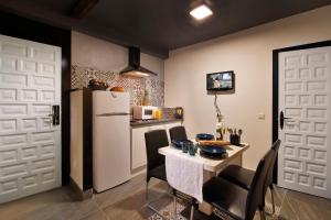 Kuchnia lub aneks kuchenny w obiekcie Apartamentos El Tiempo Madrid
