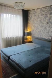 Postel nebo postele na pokoji v ubytování Apartments Fidelio