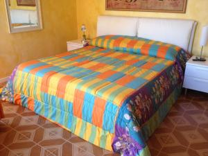Postel nebo postele na pokoji v ubytování B&B Margherita