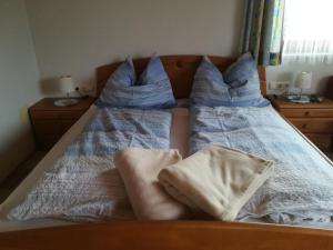 Postel nebo postele na pokoji v ubytování Sinsamreith, Familie Ensmann