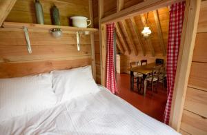 Postel nebo postele na pokoji v ubytování De Toffe Peer Recreatie