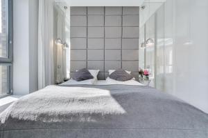 Posteľ alebo postele v izbe v ubytovaní Elite Apartments Prestige Old Town