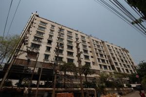 a large white building with a lot of windows at Minerva Grand Secunderabad in Hyderabad