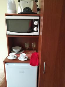 Kuchyň nebo kuchyňský kout v ubytování Hostel Lux