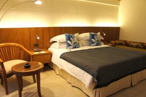 Postel nebo postele na pokoji v ubytování Safari Beach Hotel Patong