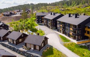 an aerial view of a village with houses at Kongsberg Booking in Kongsberg