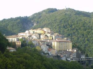 a town on top of a hill with houses at B&B Il Fruscio in Mormanno