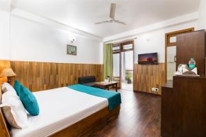 Hotel Kullu Valley客房内的一张或多张床位