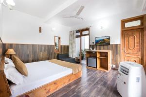 Hotel Kullu Valley客房内的一张或多张床位