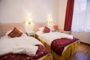 Postel nebo postele na pokoji v ubytování Brommavik Hotel