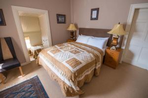 Letto o letti in una camera di Linsfort Guest House